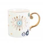 Taza de cerámica con ojos turcos y flor de loto con asa dorada